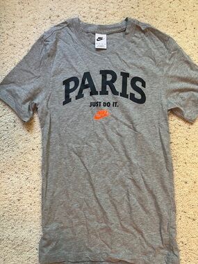 Nike Gray PARIS Graphic Tee with Orange Swoosh